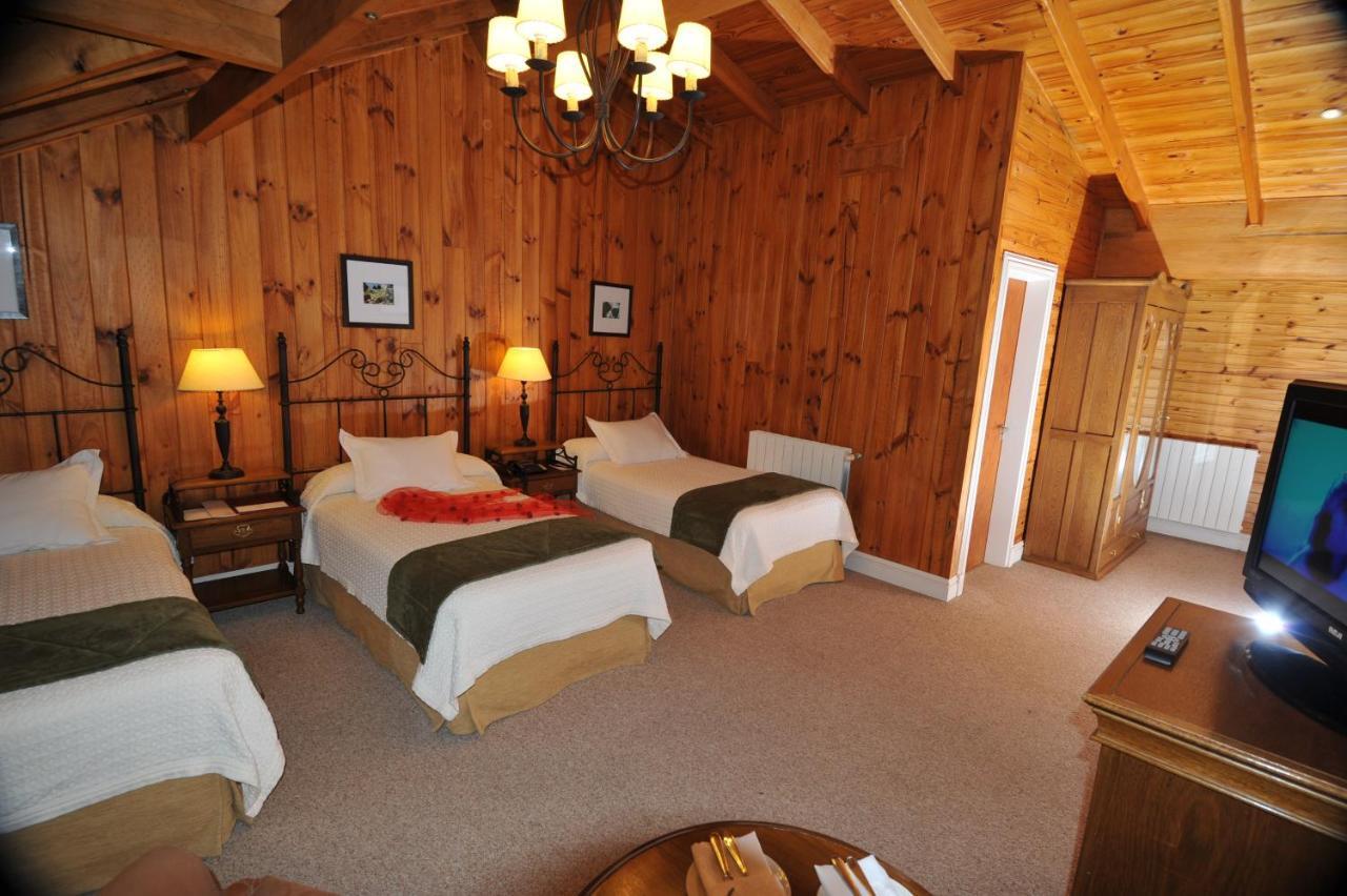 Hotel Posada Los Alamos El Calafate Rum bild