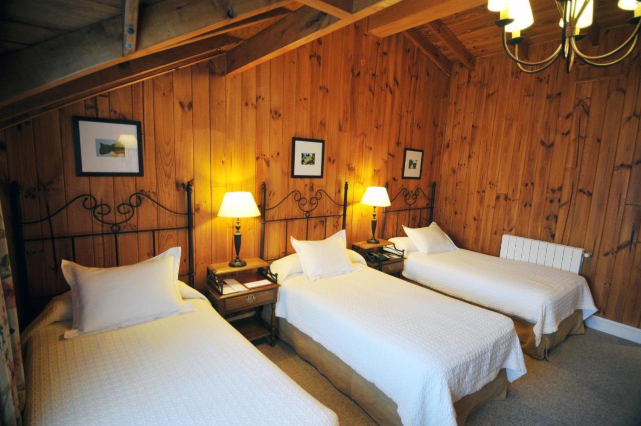 Hotel Posada Los Alamos El Calafate Rum bild